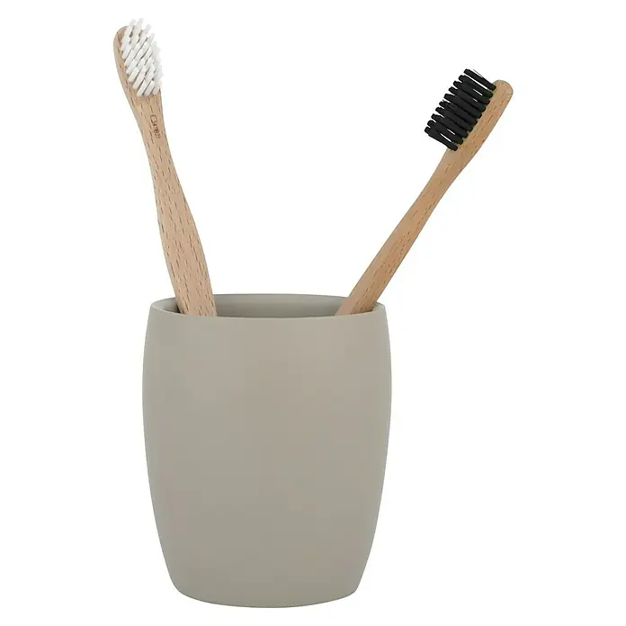 Venus Flakoni Zahnputzbecher - Beige, Polyresin - Zwei Zahnbürsten mit Holzgriff in einem beigen Zahnputzbecher, die eine nachhaltige Mundpflege symbolisieren.