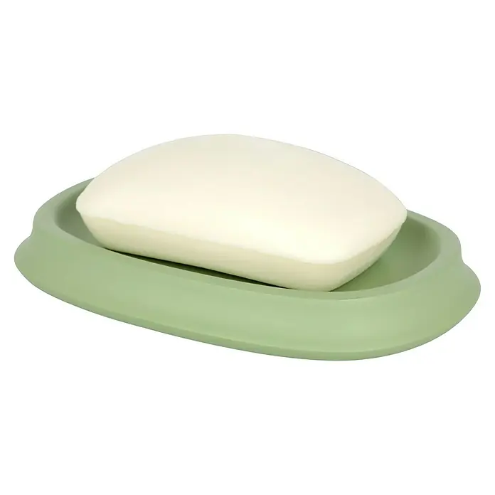 Venus Flakoni Seifenschale - Sage, Polyresin - Nahaufnahme einer weißen Seife, die in einer hellgrünen Seifenschale liegt, die das Produkt sauber und ordentlich hält.