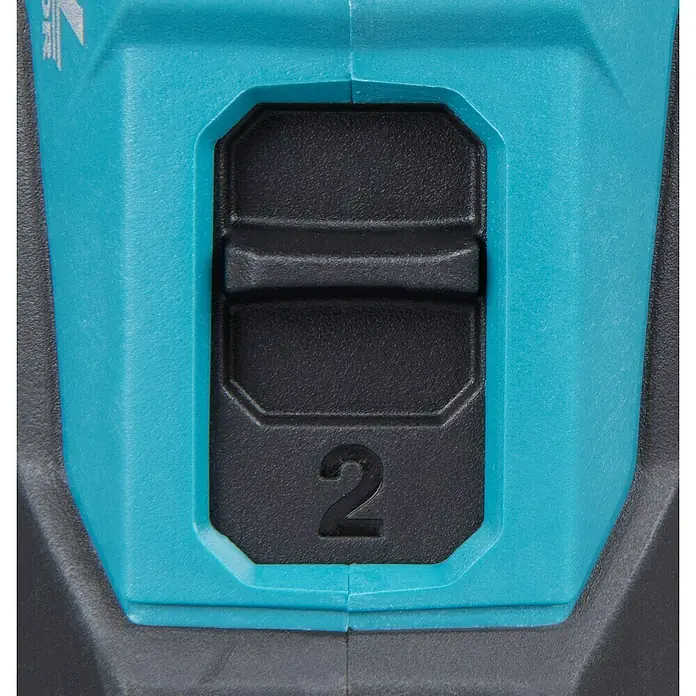 Makita Taladro atornillador percutor de batería DHP490 - 18 V, 2 baterías, 3 Ah, 65 Nm - Primer plano de una herramienta con un interruptor ajustado en "2", indicando un nivel de potencia o ajuste específico en el equipo.