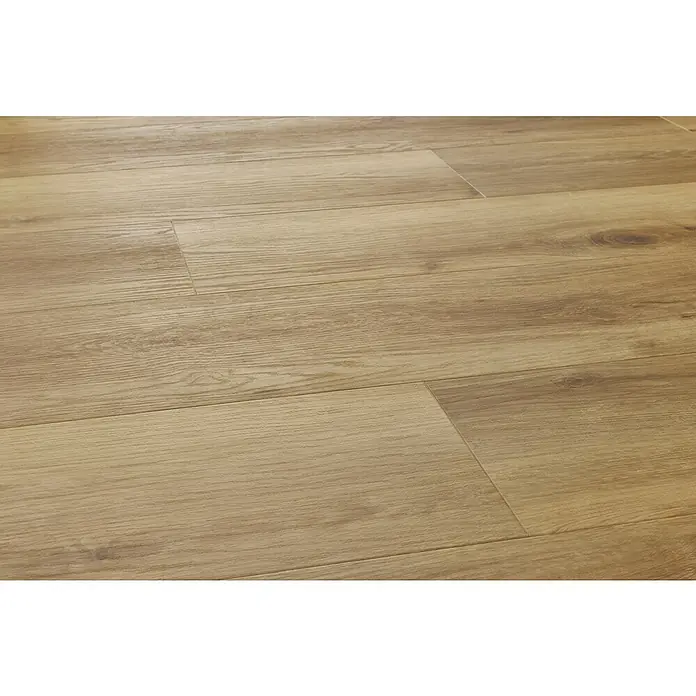 Vinylboden SPC Silent - Tucson Eiche, Landhausdiele, 1.220 x 229 x 5,3 mm - Nahaufnahme von hellem Laminatboden mit Holzmuster. Das Laminat sorgt für eine warme und einladende Atmosphäre im Raum.
