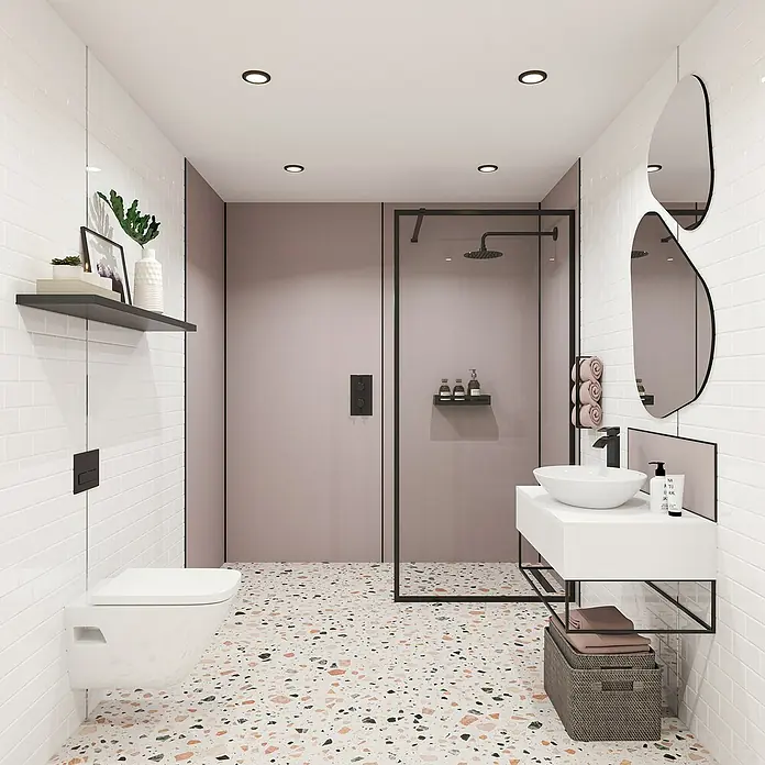 Wetwall Wandpaneel Alloy - 60 x 244 cm, Deep Blue Sea / Smoked Rose - Elegantes Badezimmer mit stilvollem Waschtisch, modernen Spiegeln und einer geräumigen Dusche. Das Terrazzo-Muster des Bodens setzt einen lebhaften Akzent.