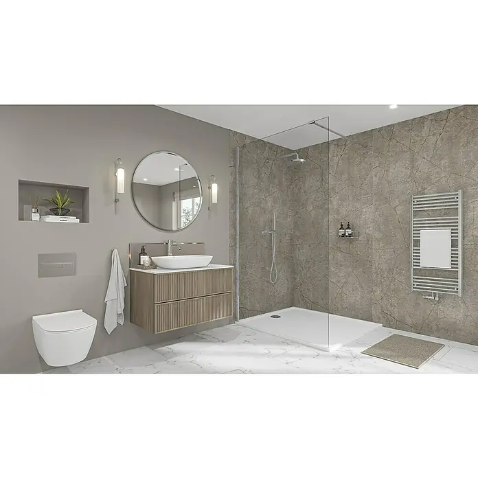 Wetwall Wandpaneel Elite - 16 x 242 cm, Gold Stone, Abgerundete Kante - Ein modernes Badezimmer mit einer Waschtischkombination in Holzoptik, einem runden Spiegel und einer begehbaren Dusche mit grauen Marmorfliesen.