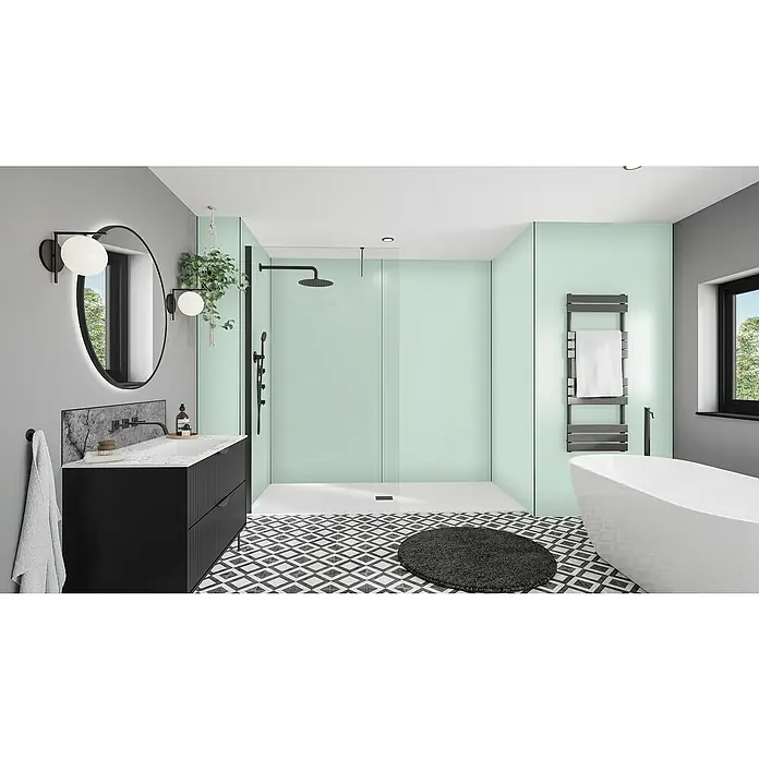 Wetwall Wandpaneel Alloy - 60 x 244 cm, Terra Grey / Seabreeze Green - Badezimmer mit einem modernen Waschtisch mit Unterschrank in Schwarz, einem runden Spiegel und einer begehbaren Dusche.