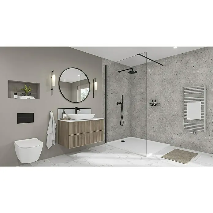 Wetwall Wandpaneel Elite - 16 x 242 cm, Pewter Terrazzo, Abgerundete Kante - Elegantes Badezimmer mit stilvollem Waschtisch mit Holzstruktur, rundem Spiegel und moderner Dusche mit dunklen Akzenten.
