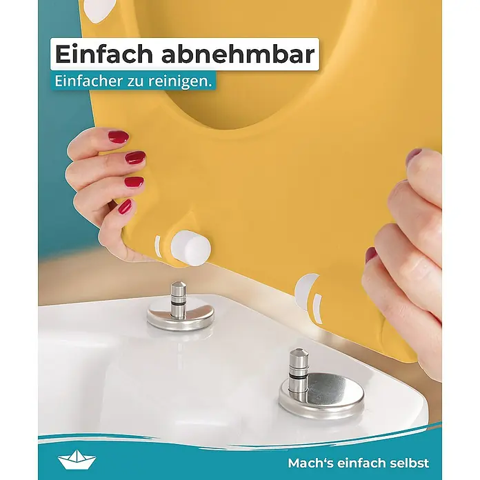 Calmwaters WC-Sitz Original - Duroplast, Curry-Gelb, Mit Absenkautomatik - Abnehmbarer gelber Toilettensitz wird auf eine Toilette montiert. "Einfach abnehmbar" und "Mach's einfach selbst" sind auf dem Bild zu sehen.