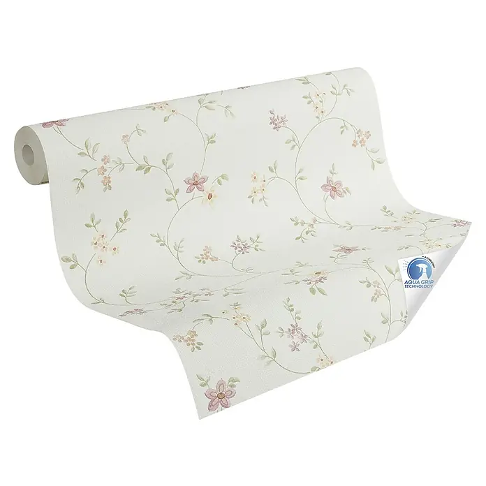 A.S. Création Designdrop Vliestapete Blume - Weiß-Rosa, Floral, 10,05 x 0,53 m - Nahaufnahme einer Rolle floral gemusterter Tapete mit hellen Blüten und grünen Blättern auf beigem Grund.