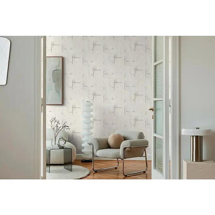 A.S. Création Cosmoliving by Cosmopolitan Vliestapete Beton - Grau-Weiß, Betonoptik, 10,05 x 0,53 m - Ein Wohnzimmer mit einer strukturierten Tapete, die dem Raum eine moderne und elegante Note verleiht. Das Design harmoniert perfekt mit der Einrichtung.