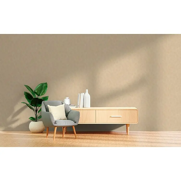 A.S. Création Hygge 3 Vliestapete Kreise - Beige-Orange, Grafisch, 10,05 x 0,53 m - Einrichtungsidee mit einer grauen Sessel, einem hellen Holzschrank und einer grünen Pflanze vor einer dezenten Wand. Die Möbelstücke harmonieren perfekt.
