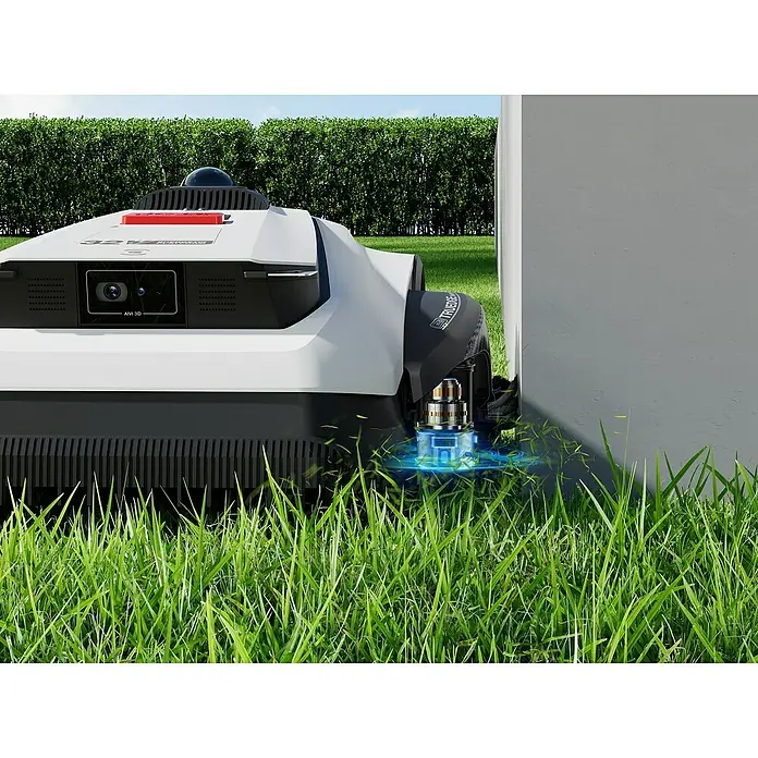 Ecovacs Goat Mähroboter A3000 LiDAR Pro - 3.000 m², Schnittbreite: 33 cm, Laser-gestützte Navigation, LiDAR - Ein automatischer Rasenmäher in Aktion, der präzise an einer Mauer entlang schneidet, um einen perfekten Rasenschnitt zu gewährleisten.