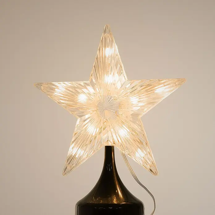 ECD Germany Künstlicher Weihnachtsbaum Außen, Höhe 150 cm, 154 LED Warmweiß, Timer, Schwarz - Schwarz, LED-Beleuchtung - Nahaufnahme eines leuchtenden, transparenten Sternbaumspitze auf einem glänzend schwarzen Sockel, der die festliche Dekoration hervorhebt.