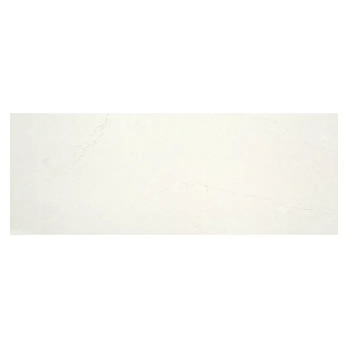 Revestimiento de pared Newlyn - 33,3 x 90 cm, Gris, Rectificado - Primer plano de una encimera de cuarzo Calacatta Classique, que muestra su elegante textura y las delicadas vetas grises. Ideal para diseños de cocina modernos.