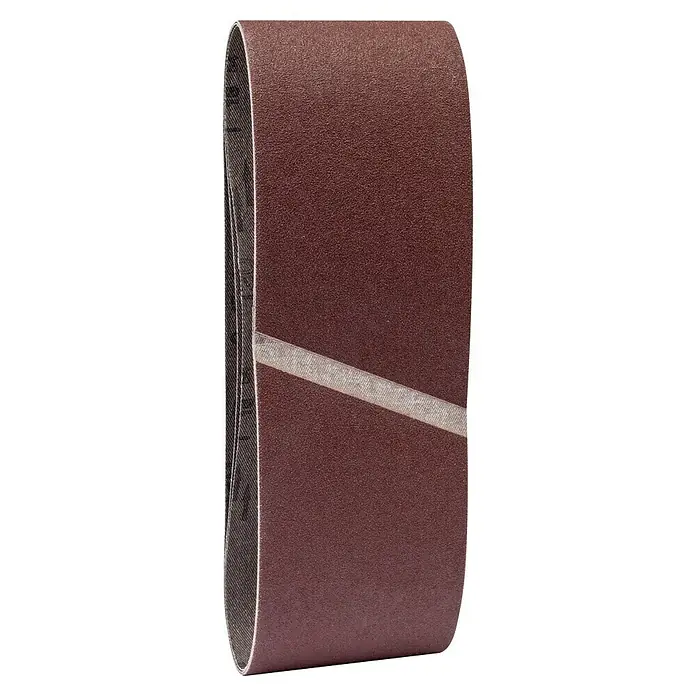 Craftomat Lija de banda - L x An: 508 x 75 mm, Grano: 120, 3 ud. - Esta imagen presenta una banda de lija, una herramienta usada para alisar superficies, en un primer plano que destaca su textura y detalles.
