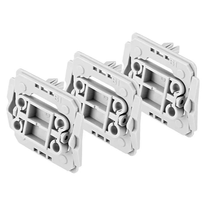 Bosch Smart Home Adapter-Set für Berker - 3 Stk. - Nahaufnahme von drei weißen Geräteklemmen B1, die sich wiederholen und die Details der Geräteanschlüsse hervorheben.