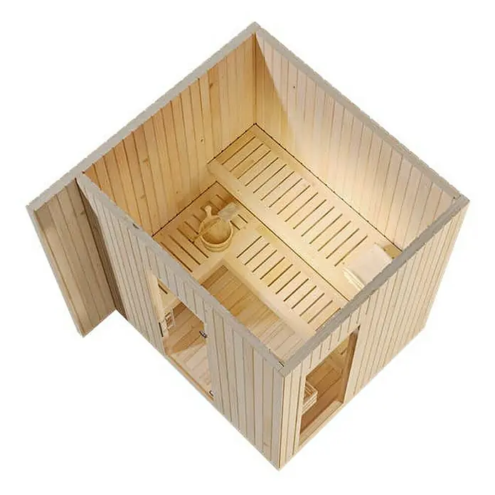 FinnTherm Saunahaus Siena Small 72mm Wandstärke -  - Innenansicht einer hellen Holzsauna mit Bänken, Kübel und Kelle, die zum Entspannen einlädt. Perfekt für Wellness zu Hause.