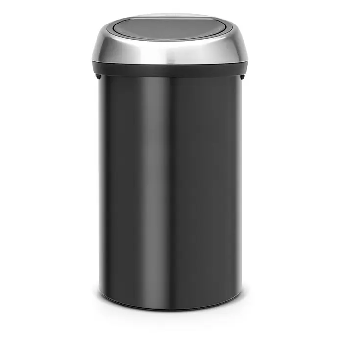Proregal Standard-Mülleimer Brabantia Abfallbehälter mit Soft-Touch-Öffnung - 60 l, Metall, Matt Schwarz-Matt Edelstahl - Edler, schwarzer Treteimer mit silbernem Deckel. Der Mülleimer ist zylindrisch und steht auf einem weißen Untergrund.