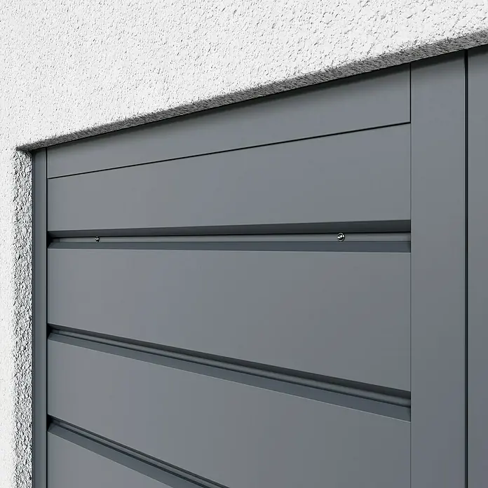 Metdach Wandabschlussprofil SG - Anthrazit, Länge: 254 cm, Stahl - Nahaufnahme einer modernen, grauen Fassadenverkleidung mit horizontalen Lamellen und sichtbaren Befestigungspunkten.