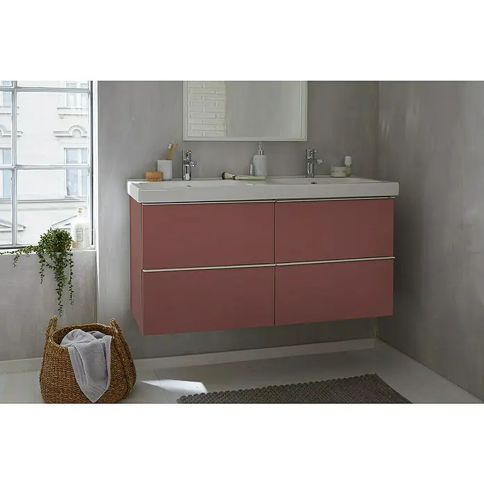 D-c-fix Klebefolie Uni Seidenmatt - 200 x 45 cm, Rost-Rot, Selbstklebend - Ein modernes Badezimmer-Waschbecken mit rosafarbenen Unterschränken unter einem Spiegel und Handtuchkorb, ideal für stilvolle Badezimmer.