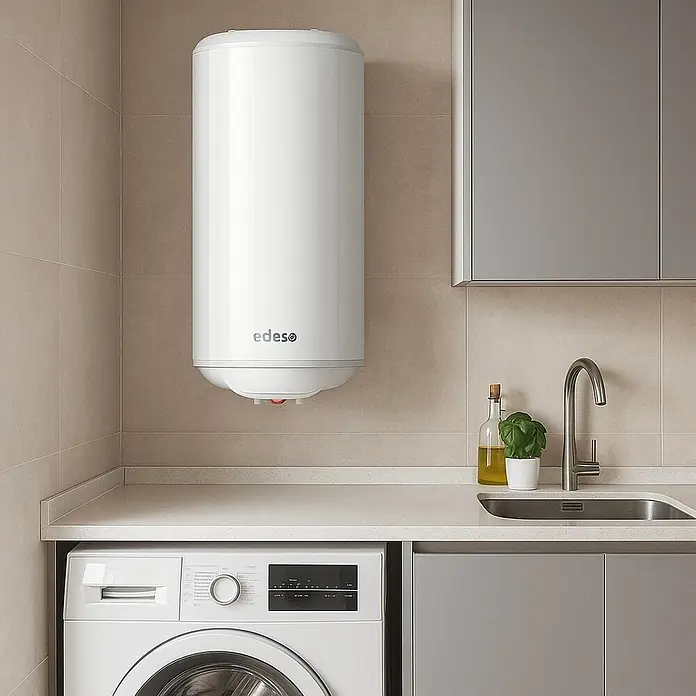 Edesa Termo eléctrico One - 80 l, 1.500 W, Termostato - Primer plano de un calentador de agua Edeso en un baño moderno con lavadora y fregadero.