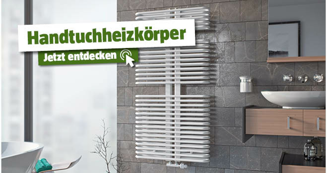 Weißer Handtuchheizkörper im Bad neben den Waschbecken