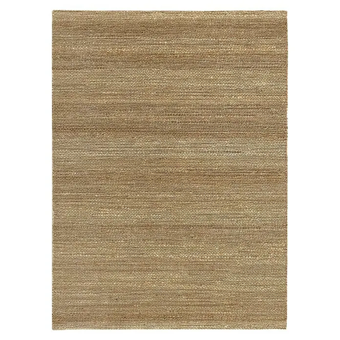 Alfombra de yute Málaga - Natural, 350 x 250 cm, 100% yute - Primer plano de una alfombra tejida con una textura fina en tonos marrones cálidos, ideal para espacios que irradian calidez y naturalidad.
