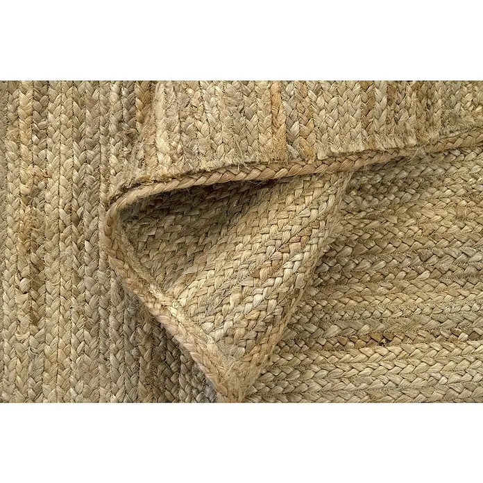 Alfombra de yute Nazar - Beige, 500 x 300 cm - Primer plano de una alfombra tejida con fibras naturales que muestra su textura rústica y calidad artesanal.