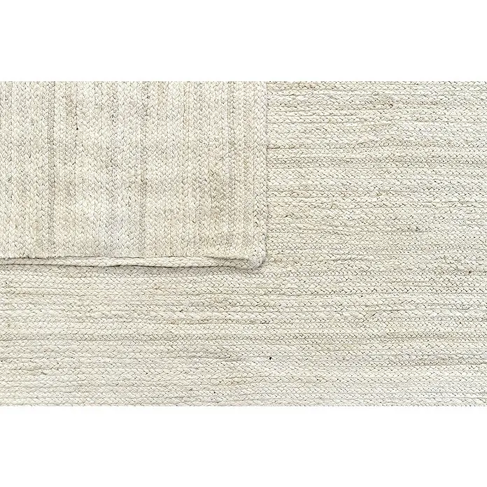 Alfombra de yute Nazar - Blanco, 300 x 250 cm - Primer plano de una alfombra de yute blanca con un patrón tejido, mostrando su textura natural y diseño sencillo.