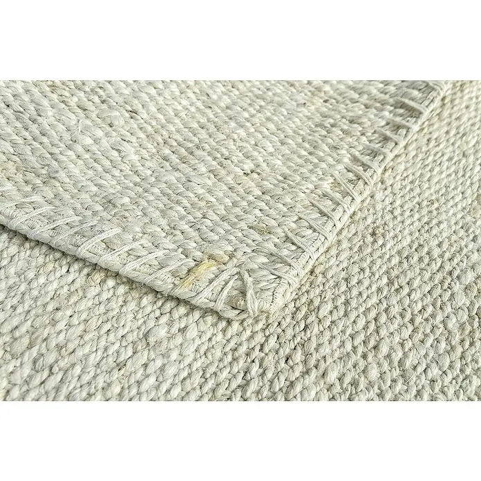 Alfombra de yute Córdoba - Blanco, 300 x 240 cm, 100% yute - Primer plano de una alfombra blanca tejida, resaltando su textura y detalles artesanales. Perfecta para un toque acogedor.