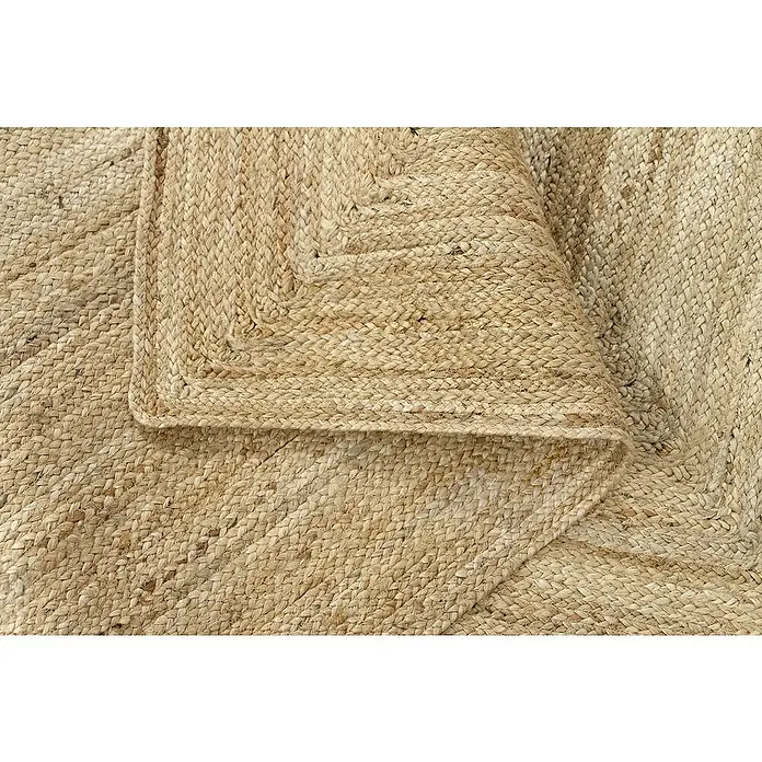 Alfombra de yute Nazar - Beige, 360 x 220 cm - Primer plano de una alfombra de yute tejida, destacando la textura y el patrón natural. Colores y textura natural.