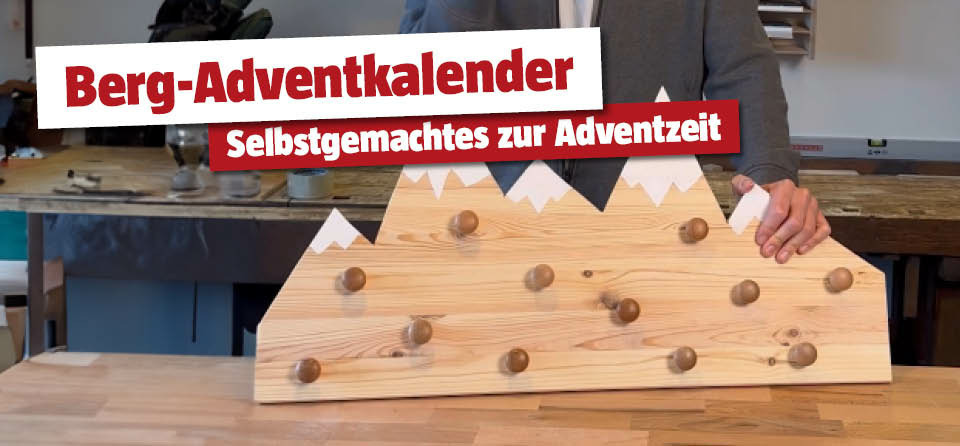 Selbstgemachter Adventkalender aus Holz in Berg-Form