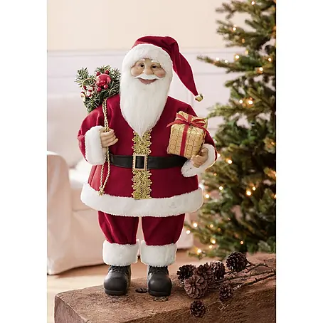 Weihnachtsmann mit Geschenk und Tanne