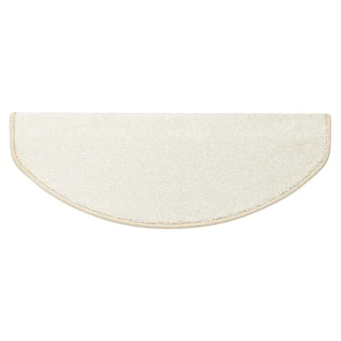 Stufenmatte Sundae - 65 x 23,5 cm, Creme, Halbrund - Detailansicht eines cremefarbenen, halbkreisförmigen Teppichs mit sanfter Textur und feiner Umrandung, der Wärme und Komfort ausstrahlt.