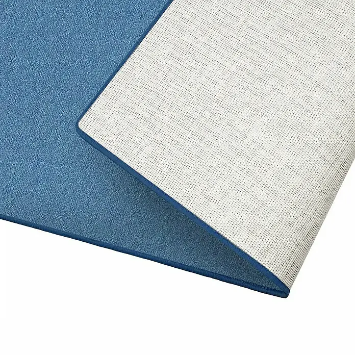 Flachgewebeteppich London - Hellblau, 200 x 200 cm, 100 % Polypropylen - Nahaufnahme einer blauen Teppichunterseite, die eine rutschfeste Oberfläche für zusätzliche Sicherheit und Haltbarkeit aufweist.