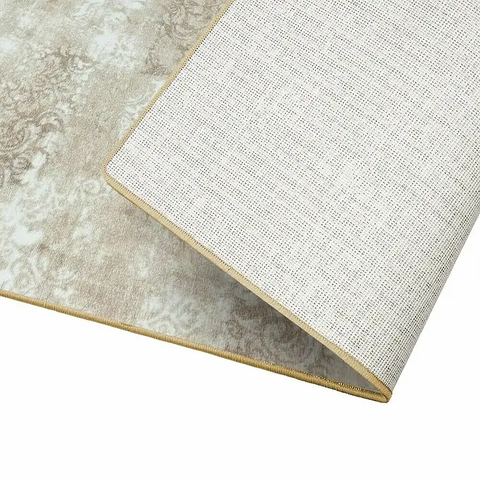 Teppichläufer Davoli - Beige, 400 x 80 cm, 100 % Polyamid - Detailansicht eines beigefarbenen Teppichs mit Muster und rutschfester Unterseite. Ideal für Wohnräume, die Komfort und Stil vereinen.