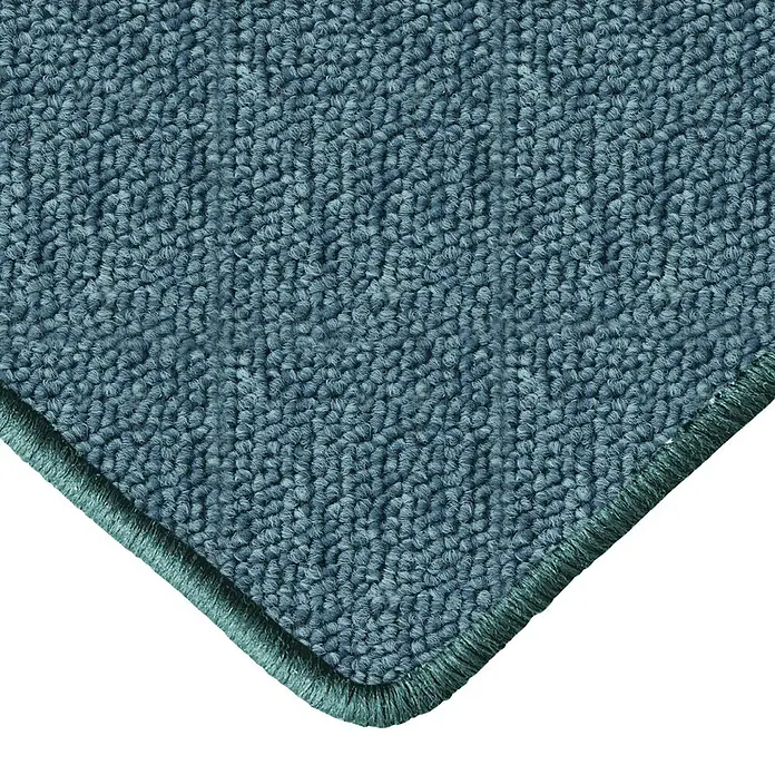 Flachgewebeteppich London - Grün, 100 x 100 cm, 100 % Polypropylen - Detailansicht eines blauen Teppichs mit schmaler Bordüre. Die Textur und Farbe des Teppichs sind gut erkennbar.