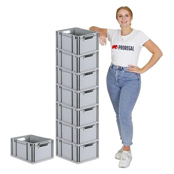 Proregal Euroboxen-Set 8x Eurobox NextGen Economy mit Auflagedeckel und 4x Verschlüsse Schwarz - Kunststoff, Grau, 8 Stk. - Graue Lagerboxen gestapelt und eine einzelne Box daneben, eine Frau lehnt an dem Stapel.