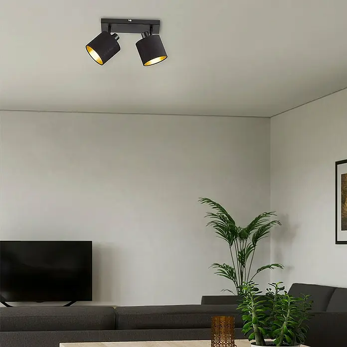 Reality Leuchten Tommy Regleta - 28 W, Altura: 19 cm, Negro, E14, 2 ud. - Esta imagen muestra una lámpara de techo negra moderna con dos focos, ofreciendo una solución de iluminación elegante para cualquier habitación.