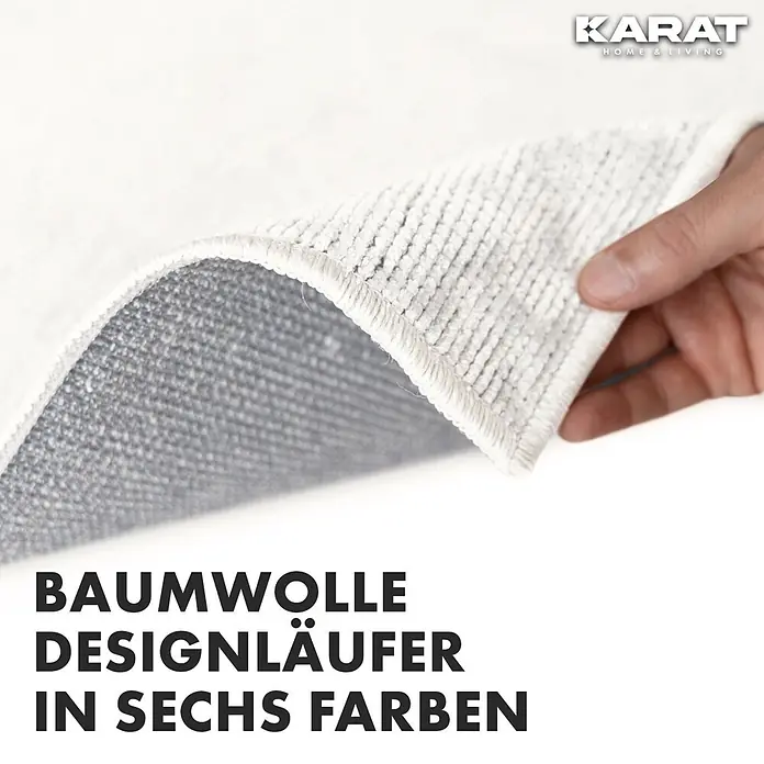 Teppichläufer Azade - Elfenbein, 250 x 80 cm, 65 % Baumwolle, 35 % Polyester - Nahaufnahme eines weißen Baumwollteppichs von Karat Home & Living, der die Textur und Qualität hervorhebt.
