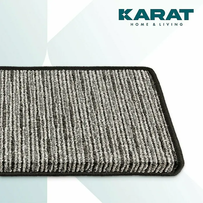 Stufenmatte Geneva - 65 x 23,5 cm, Anthrazit, Rechteck - Nahaufnahme eines grau-weiß gestreiften Läufers mit schwarzer Umrandung, präsentiert von Karat Home & Living.