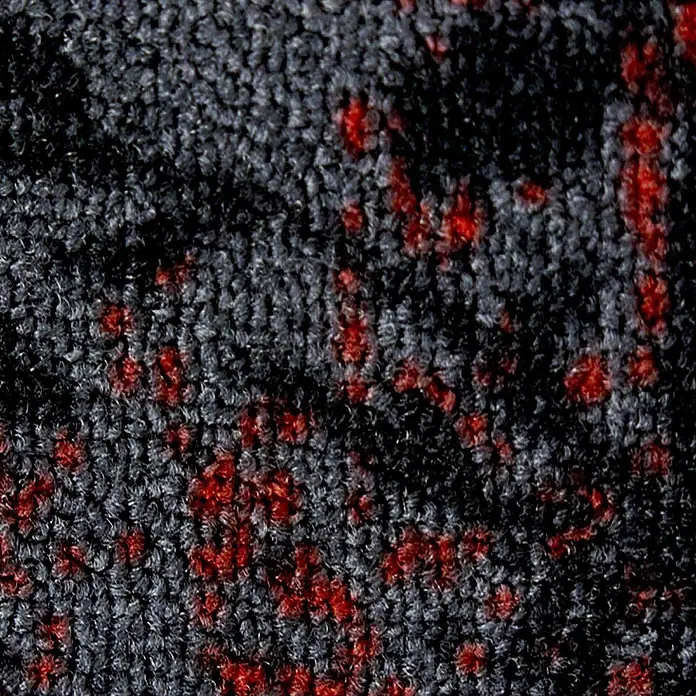 Teppichläufer Maraba - Rot, 200 x 80 cm, 100 % Polyamid - Ein Teppich mit dunklem Grundton und roten Farbakzenten. Die Textur des Teppichs ist deutlich erkennbar.