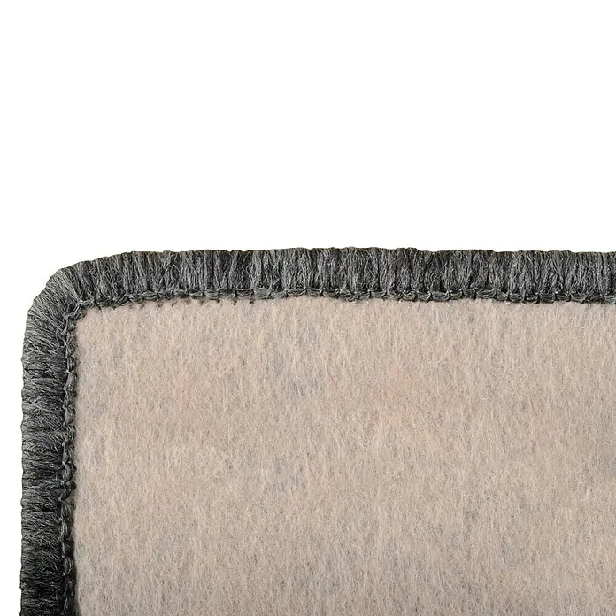 Flachgewebeteppich Kalkutta - Anthrazit, 100 x 100 cm, 83 % Polypropylen, 17 % Naturfaser - Detailaufnahme einer Teppichkante mit grauem Saum und beigem Teppich, der eine hochwertige Verarbeitung zeigt.
