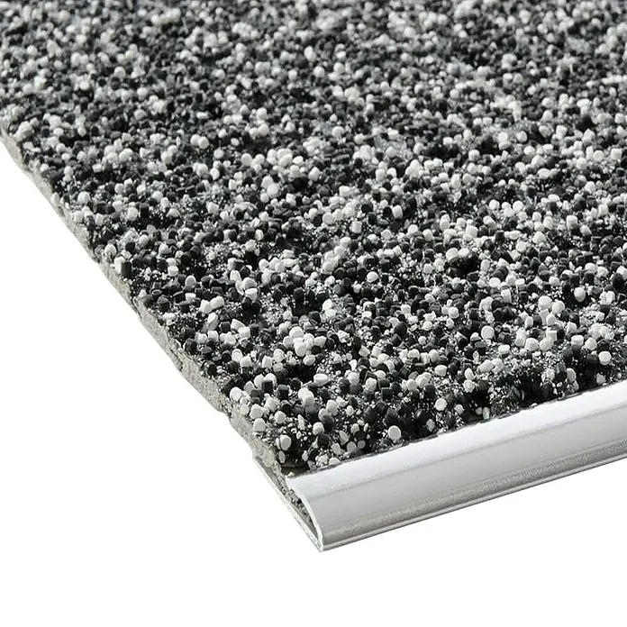 Stufenmatte - 60 x 24 cm, Anthrazit - Nahaufnahme einer grau-schwarzen Bodenbeschichtung mit silberner Kantenschiene, ideal für moderne Innenräume.