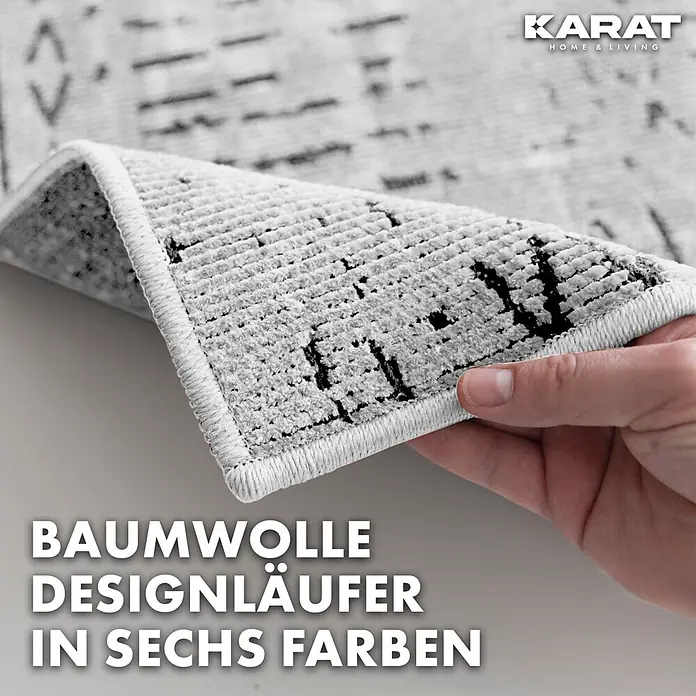 Teppichläufer Vena - Elfenbein, 100 x 80 cm, 65 % Baumwolle, 35 % Polyester - Bild eines Baumwoll-Designläufers in sechs Farben von Karat Home & Living, das Muster und die Textur hervorhebt.