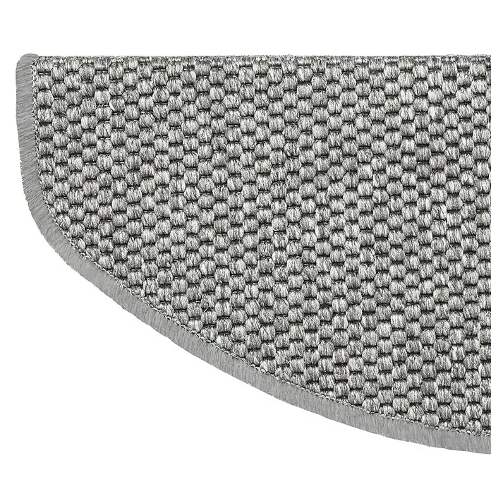 Stufenmatte Kalkutta - 65 x 23,5 cm, Silber, Halbrund - Detailaufnahme eines grauen Teppichläufers mit dekorativem Rand, ideal für Treppen oder Flure. Robuste Textur trifft auf elegantes Design.