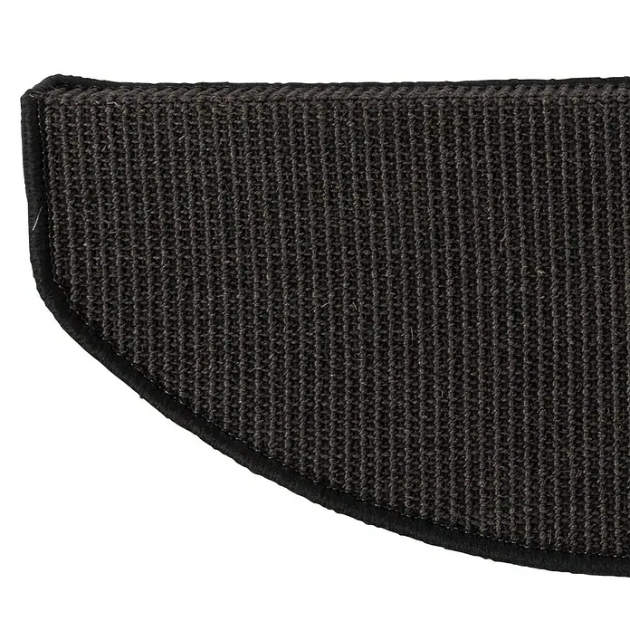 Stufenmatte Premium - 65 x 23,5 cm, 100 % Sisal, Schwarz - Nahaufnahme einer schwarzen Fußmatte mit Textur und abgerundeter Kante, ideal für Eingänge oder als Schutz.
