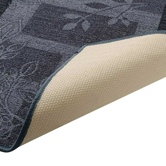 Teppichläufer Akzent - Grau, 100 x 67 cm, 100 % Polyamid - Nahaufnahme einer blauen Fußmatte mit blumigem Muster und rutschfester Unterseite, ideal für den Innenbereich.