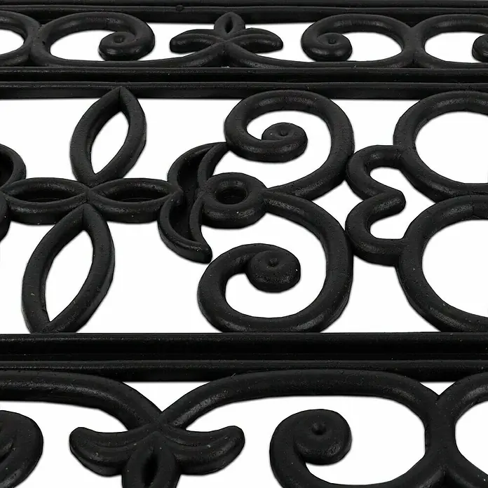 Stufenmatte Colo - 65 x 25 cm, 100 % Gummi, Schwarz - Nahaufnahme eines schwarzen, gusseisernen Gartenbankdesigns mit floralen Motiven und verschlungenen Mustern.