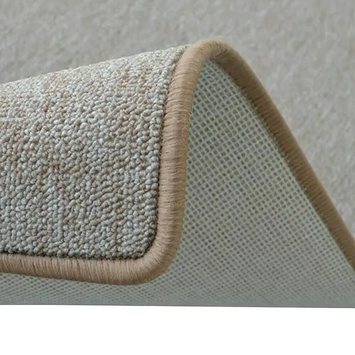 Flachgewebeteppich London - Beige, 100 x 100 cm, 100 % Polypropylen - Detailaufnahme eines beigen Teppichs mit gekettelten Kanten, der die Textur und die Verarbeitung hervorhebt.