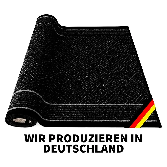 Teppichläufer Olymp - Anthrazit, 250 x 80 cm, 100 % Polyamid - Schwarze Schmutzfangmatte mit Rautenmuster und grauen Streifen am Rand, teilweise aufgerollt. Hergestellt in Deutschland.