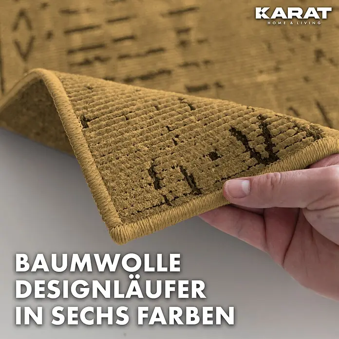 Teppichläufer Vena - Beige, 100 x 80 cm, 65 % Baumwolle, 35 % Polyester - Nahaufnahme eines Baumwoll-Designläufers in Senfgelb mit dunklem Muster und dem Öko-Tex Siegel.