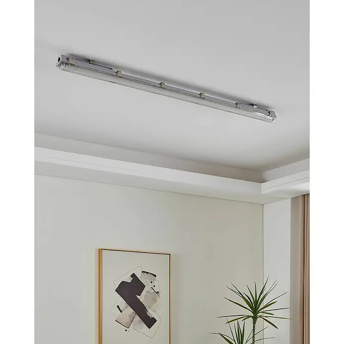 Eglo Plafón para pared y techo Basic Plus 1 - 23 W - Una luz tubular gris está montada en un techo blanco, proporcionando iluminación funcional a la habitación.